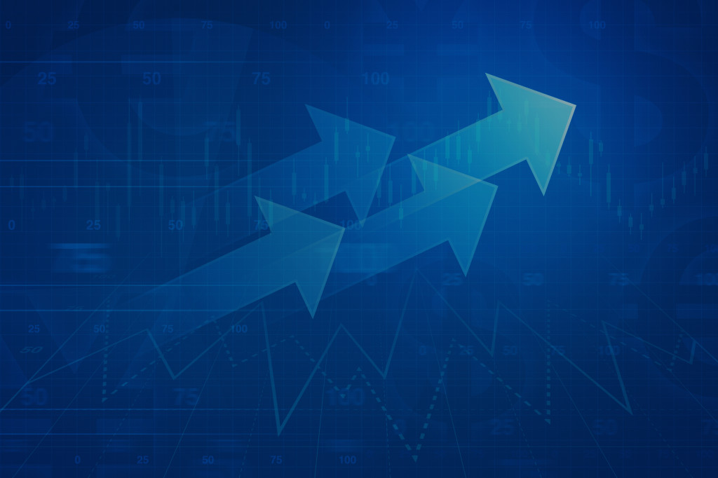 Arrow on financial graph and chart, success business concept